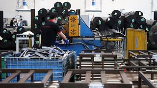 China's factory output, retail sales slow, miss expectations
