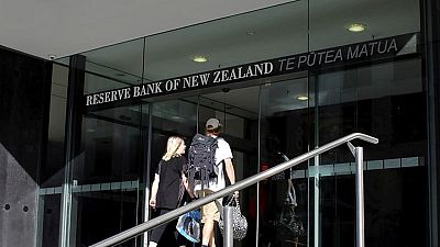 New Zealand holds rates at record low as fresh COVID-19 outbreak stokes uncertainty