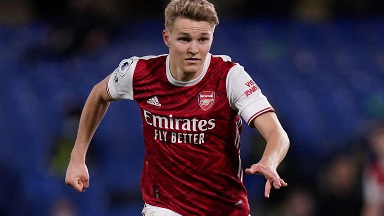 Soccer-Arsenal sign Odegaard from Real Madrid on permanent deal