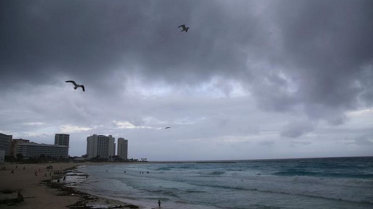 Hurricane Grace pounds Mexico's Caribbean coast with heavy rain