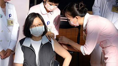 Taiwan's president leads way in first domestic COVID-19 vaccine