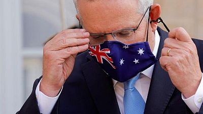 Australia PM backs reopening targets, says COVID-19 lockdowns unsustainable