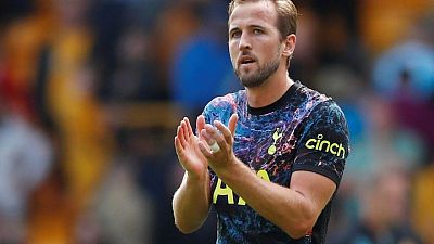 Soccer-Kane says he will stay at Tottenham Hotspur