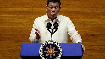 Relatives of Philippine drug war victims alarmed by Duterte's talk of staying on