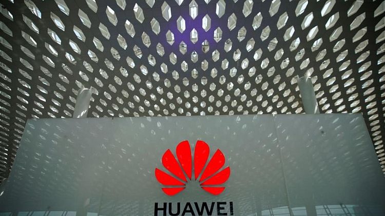 Biden admin defends approving licenses for auto chips for Huawei