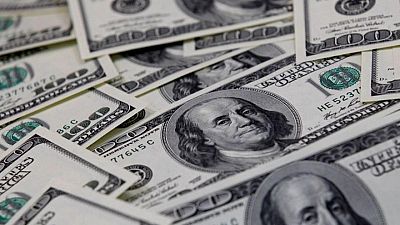 Dollar pinned as Powell plods toward tapering