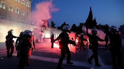 Greek police use tear gas, water canon during Athens vaccine protest Greek police use tear gas, water canon during Athens vaccine protest