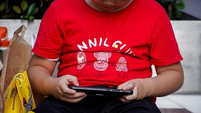 Explainer-Why and how China is drastically limiting online gaming for under 18s Explainer-Why and how China is drastically limiting online gaming for under 18s