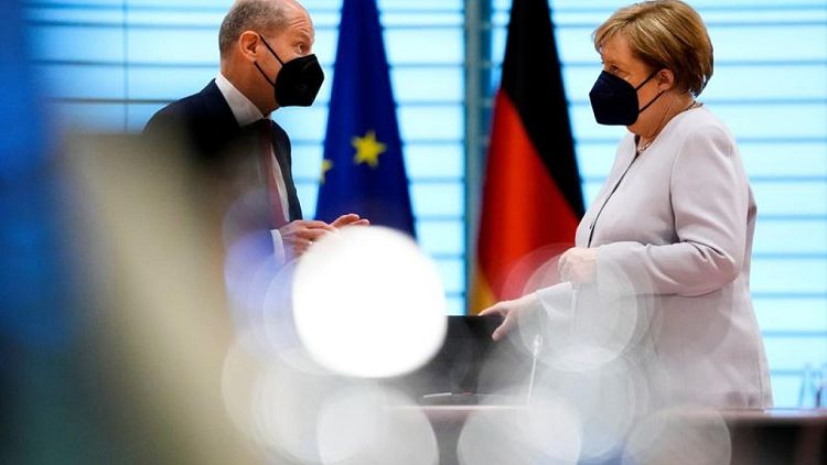 Merkel takes aim at SPD's Scholz over far-left coalition option