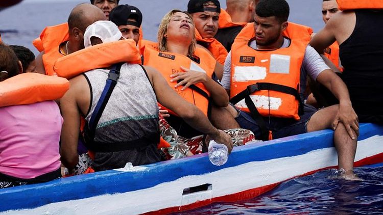 Rescue boat keeps migrant plight in spotlight as Mediterranean arrivals soar