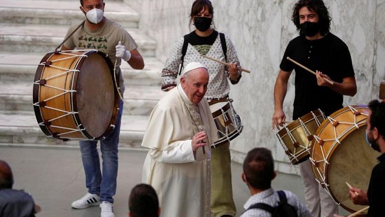 Pope denies resignation report, says leads normal life after surgery