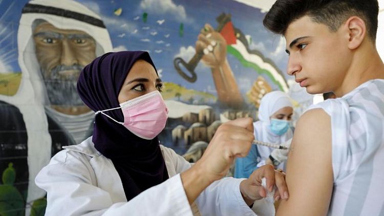 COVID vaccine mandates - and prizes - boost uptake among Palestinians