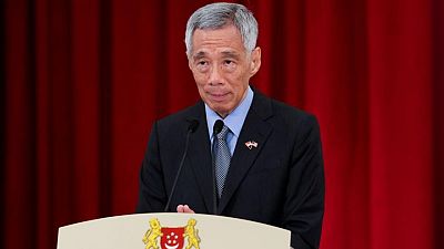 Singapore PM wins more defamation suits against bloggers Singapore PM wins more defamation suits against bloggers