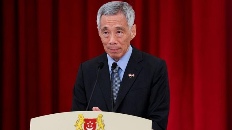 Singapore PM wins more defamation suits against bloggers