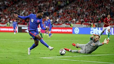 Soccer-Slick England cruise to 4-0 win in Hungary Soccer-Slick England cruise to 4-0 win in Hungary