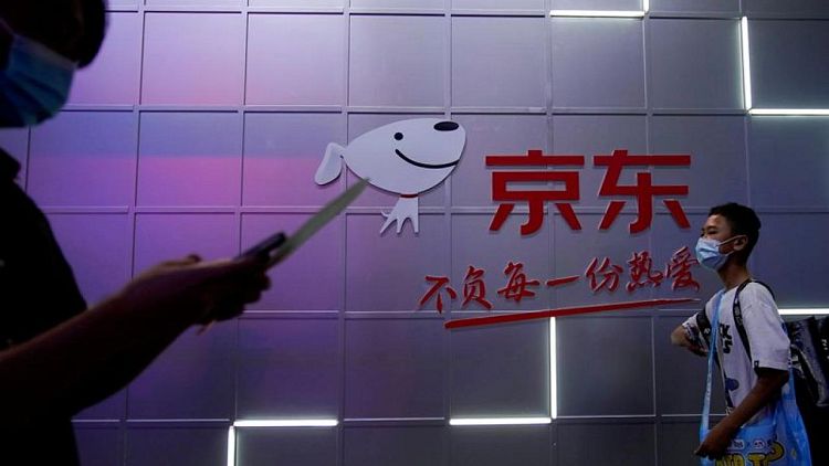 JD.com unit makes $513 million controlling bid in China Logistics