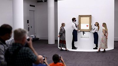 Three years on, shredded Banksy artwork returns to auction Three years on, shredded Banksy artwork returns to auction
