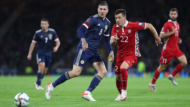 Soccer-Scotland beat Moldova 1-0 on a night of squandered chances