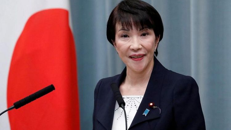 Japan's COVID vaccine minister favoured for PM; woman wins backing - media
