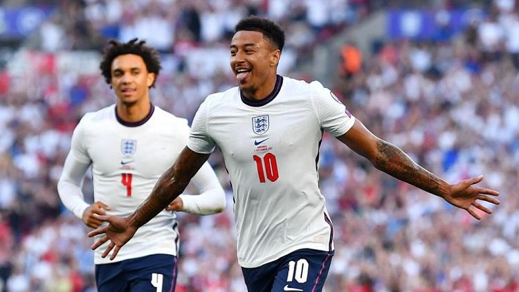 Soccer-Lingard double helps England ease past Andorra