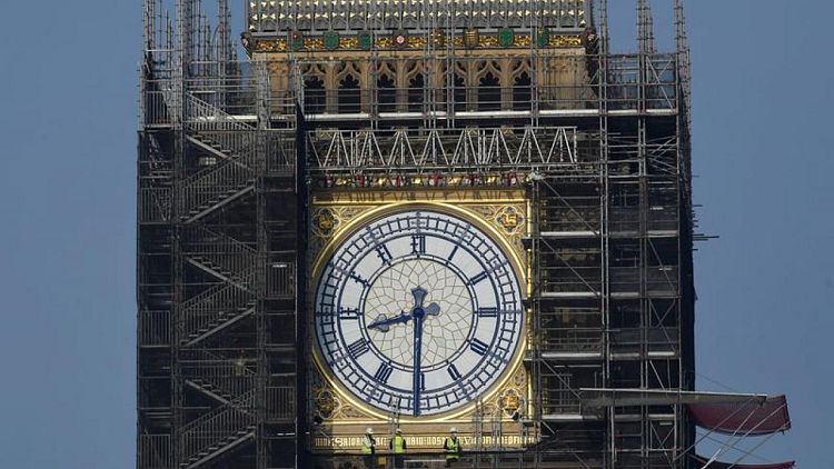 UK's Big Ben tower gets the blues as clock hands return