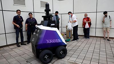 Singapore trials patrol robots to deter bad social behaviour Singapore trials patrol robots to deter bad social behaviour