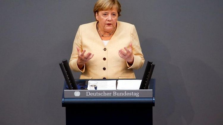 Merkel implores Germans to back conservatives as they hit record low