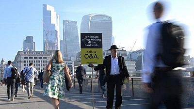 Los trabajadores del sector financiero de Londres vuelven a la oficina en medio del calor