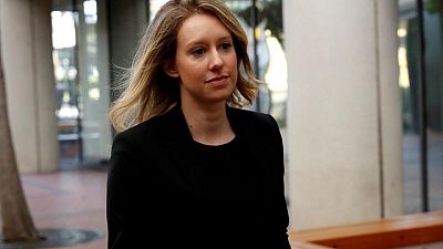 Theranos founder Elizabeth Holmes takes stand to defend herself in fraud case