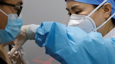 Beijing city mandates COVID-19 vaccine booster shots for some workers