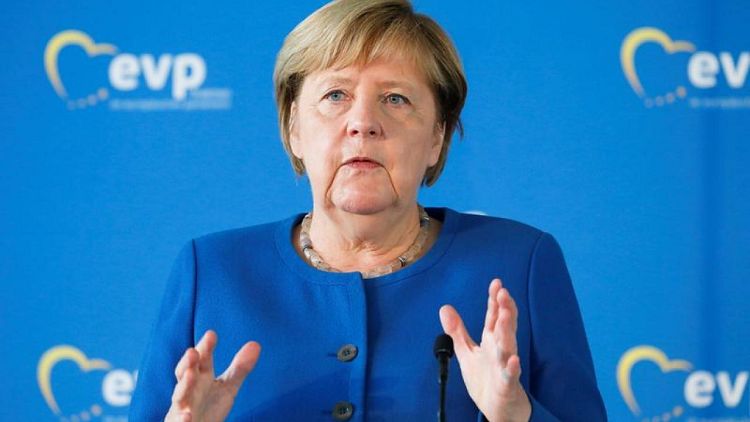 Merkel says her conservatives face tough battle after 16 years in power