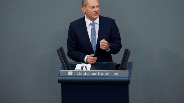 Merkel ally presses SPD's Scholz over money laundering probe