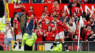 Soccer-Ronaldo debut double as Man Utd thrash Newcastle to go top Soccer-Ronaldo debut double as Man Utd thrash Newcastle to go top