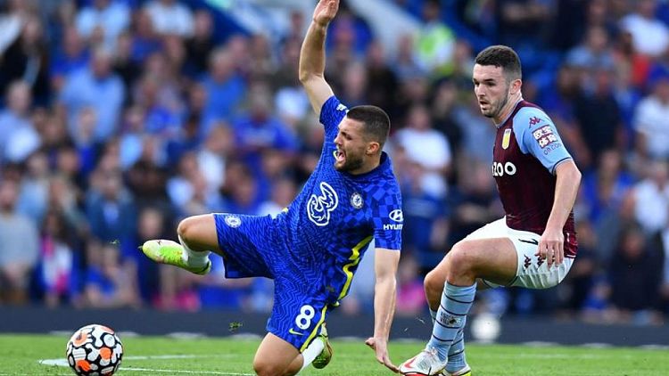Soccer-Chelsea trying to identify fan who aimed sectarian abuse at Villa's McGinn
