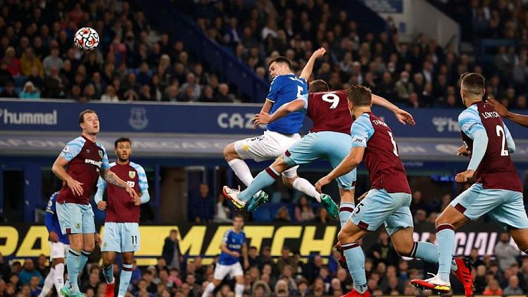 Soccer-Everton hit back in style to beat Burnley