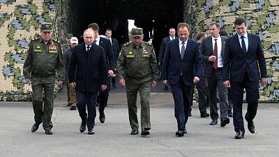 Putin oversees vast war games ahead of parliamentary election Putin oversees vast war games ahead of parliamentary election