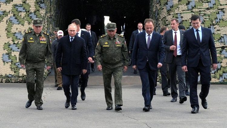 Putin oversees vast war games ahead of parliamentary election