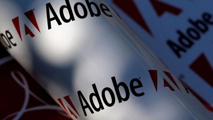 Adobe jumps into e-commerce payments business in challenge to Shopify