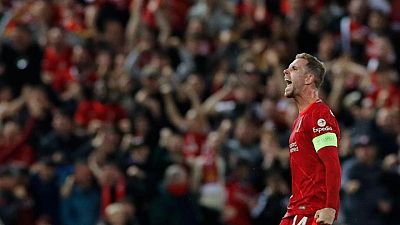 Soccer-Henderson fires winner as Liverpool beat Milan in thriller