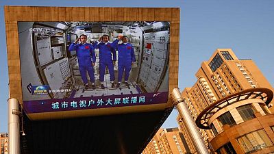 Chinese astronauts return after 90-day mission to space station
