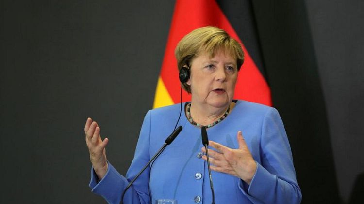 Merkel aide warns against protracted coalition talks as TV debate nears