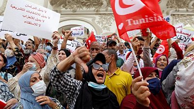 Tunisians protest over president's seizure of powers Tunisians protest over president's seizure of powers