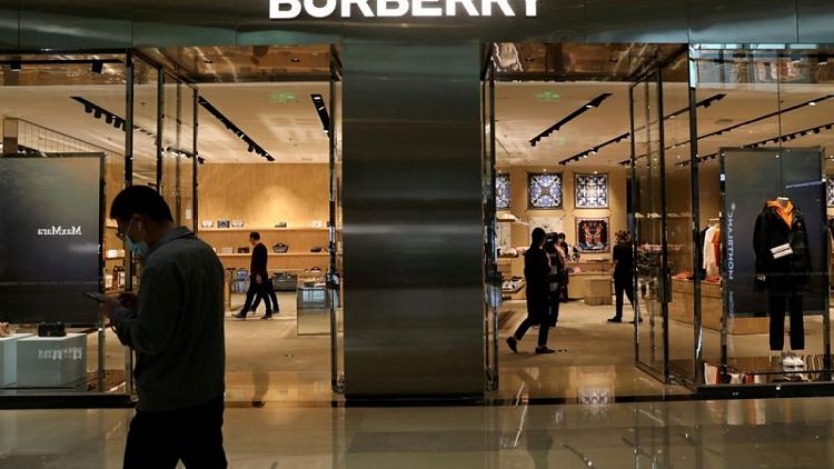 UK's Burberry names Versace boss Akeroyd as CEO