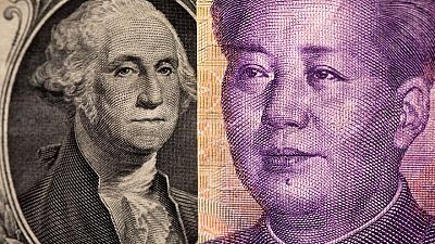 Dollar holds gains, yuan under pressure as Evergrande risks grow