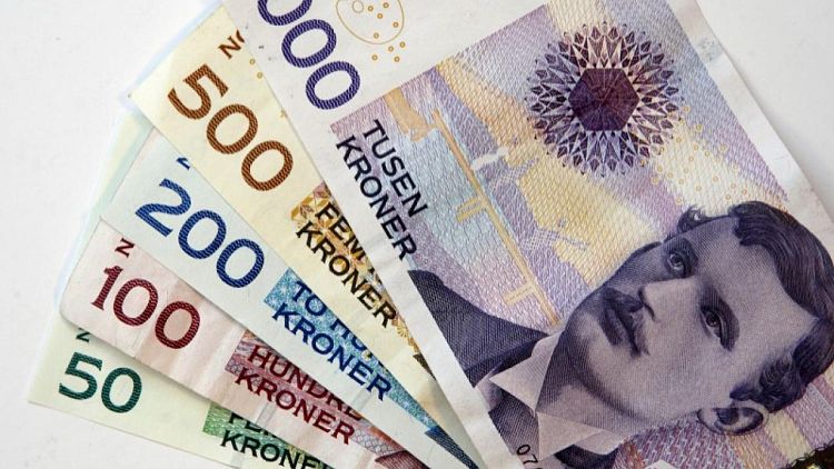 Corona noruega lidera avance ante dólar tras decisión de tasas del Norges Bank