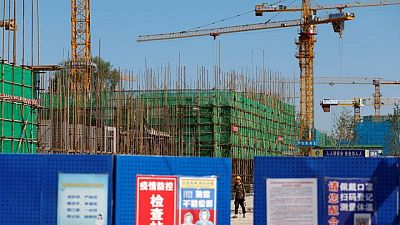 Analysis-Chinese property debt issuers face 'Evergrande premium' as worries mount