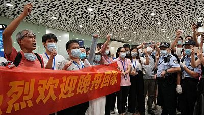 China da la bienvenida en casa a ejecutiva de Huawei, guarda silencio sobre canadienses liberados China da la bienvenida en casa a ejecutiva de Huawei, guarda silencio sobre canadienses liberados