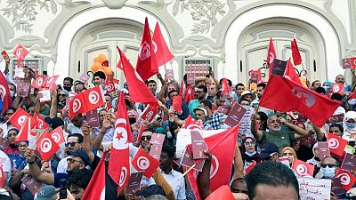Tunisians protest against president's power grab as opposition deepens Tunisians protest against president's power grab as opposition deepens