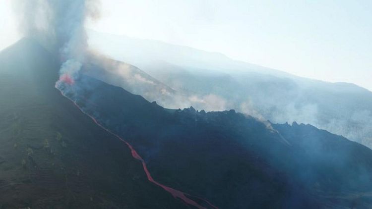 La Palma volcano roars back to life as lava nears the sea