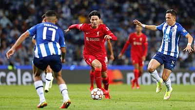 Soccer-Salah strikes twice as Liverpool thrash injury-hit Porto